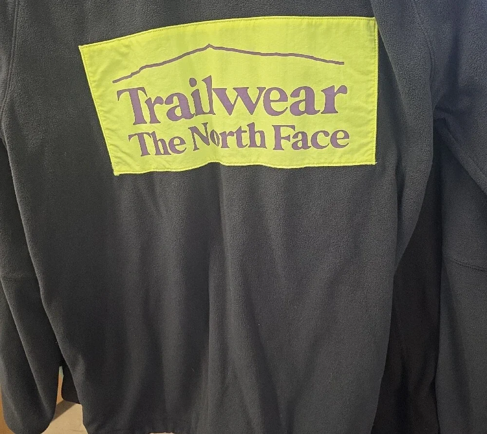 The North Face Black Fleece Jacket with Neon Yellow Zipper Tab
